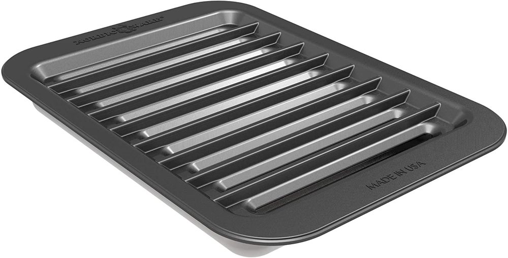 nordic ware compact cast grill & sear broiling pan isolated on white background