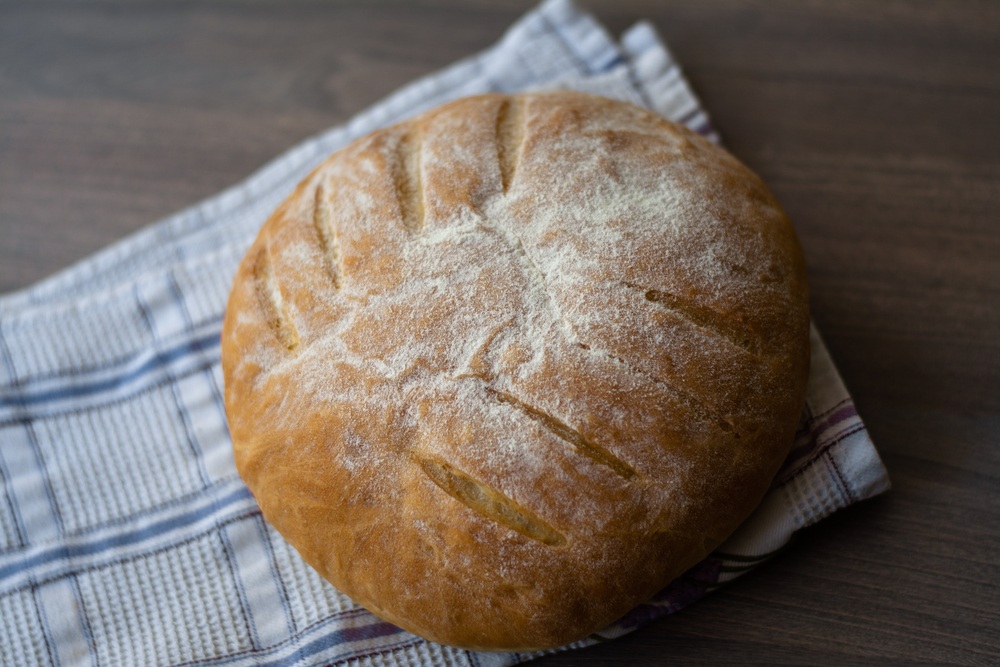 round sourdough homemade leaf scoring pattern bread